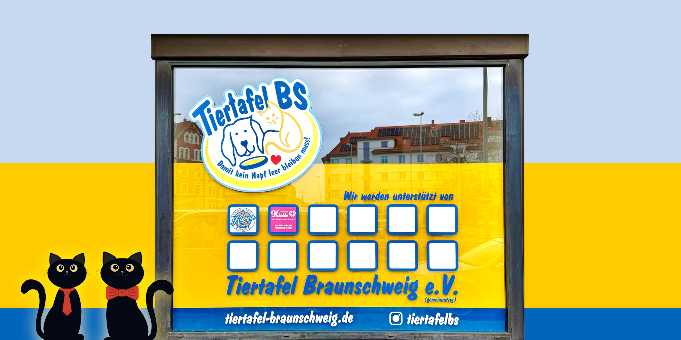 Schaufenster mit buntem Tiertafel BS Logo, fröhlicher Katze und Sponsorenfeldern