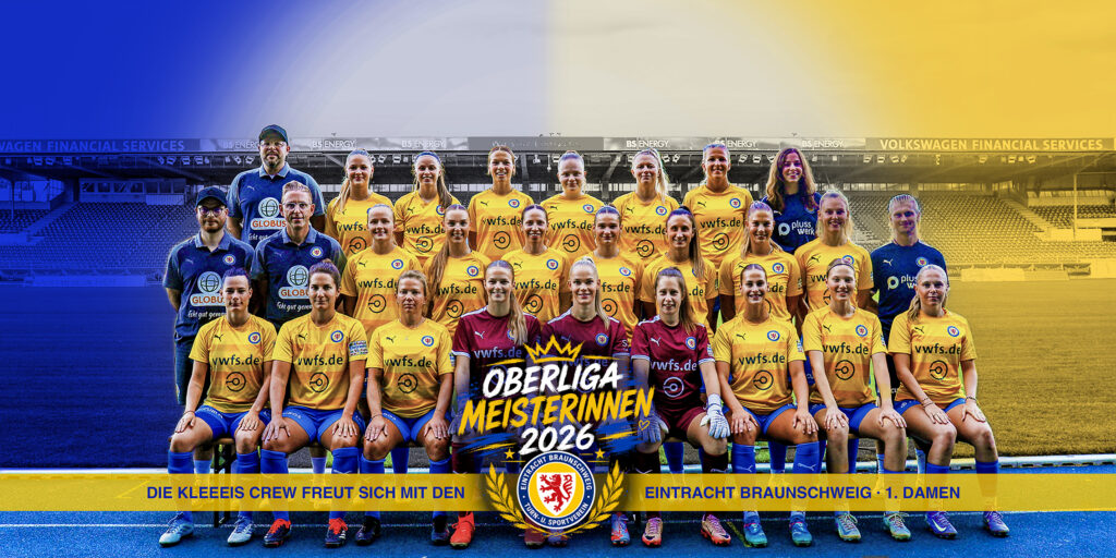Eine Gruppe lachender Frauen im gelb-blauen Trikot von Eintracht Braunschweig